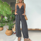 Dames jumpsuit van denim met diepe V-hals