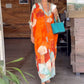 Lange jurk met bloemenprint en halve mouwen