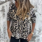 Dames stretch top met luipaardprint en ronde hals