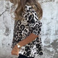 Dames stretch top met luipaardprint en ronde hals