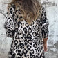 Dames stretch top met luipaardprint en ronde hals