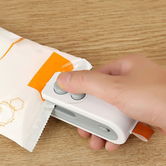 2-in-1 mini draagbare oplaadbare zakkensluit- en snijmachine