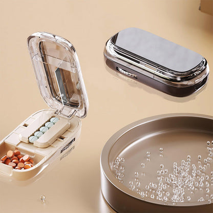 🔥Nieuw binnen 50% KORTING🎁 Draagbaar pillendoosje met pillensnijder