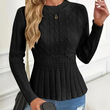 Dames trui met dikke steken, ronde hals en peplum