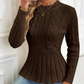 Dames trui met dikke steken, ronde hals en peplum