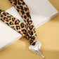 Sjaalketting met luipaardprint en onregelmatige hanger