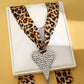 Sjaalketting met luipaardprint en onregelmatige hanger