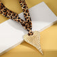 Sjaalketting met luipaardprint en onregelmatige hanger