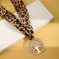 Sjaalketting met luipaardprint en onregelmatige hanger