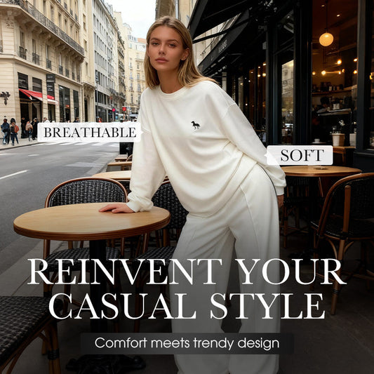 Dames set van twee stukken: geborduurde top met lange mouwen en ronde hals en broek